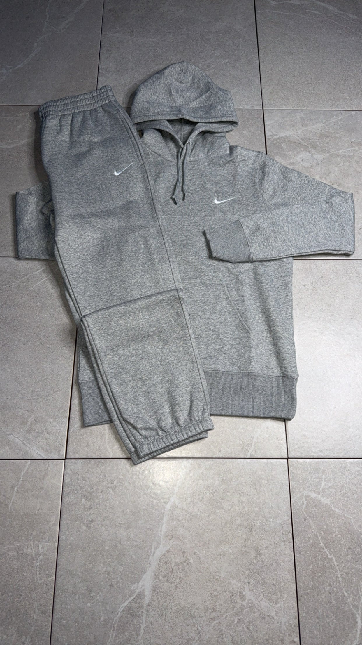 Nike swoosh suit